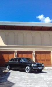 3-car-garage-mansion.-CENTRALAMERICALIMOUSINE-MERCEDES-300D-LANG.jpg